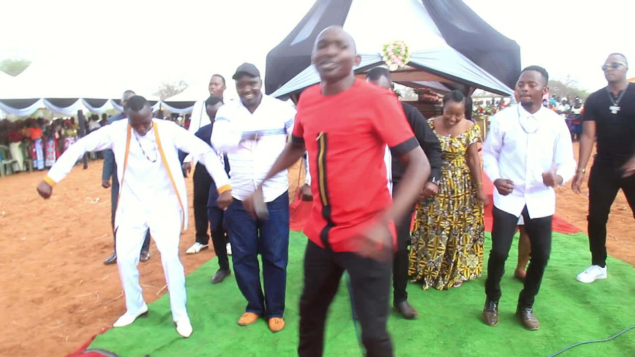 JOHN MBAKA PERFORMS LIVE AT DANNY'S DADS BURIAL. DIAL *812*292#