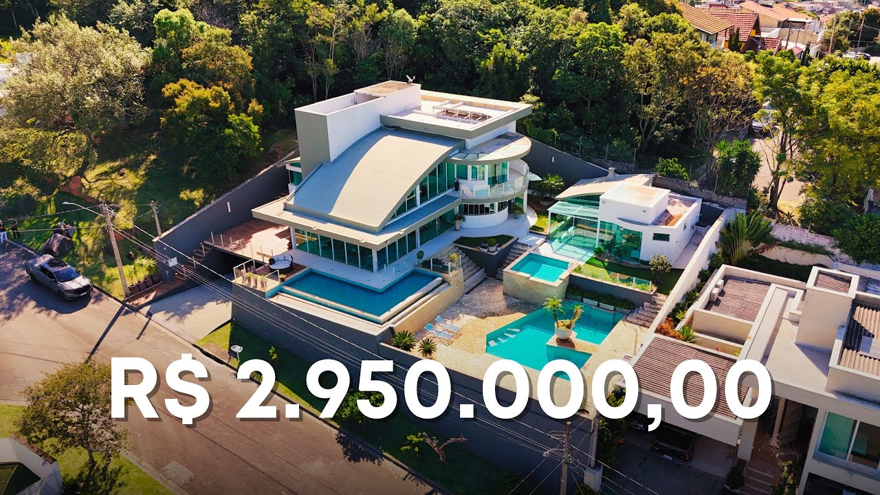 CASA DE VIDRO COM VISTA IMPRESSIONANTE DE CONDOMÍNIO EM ATIBAIA SP