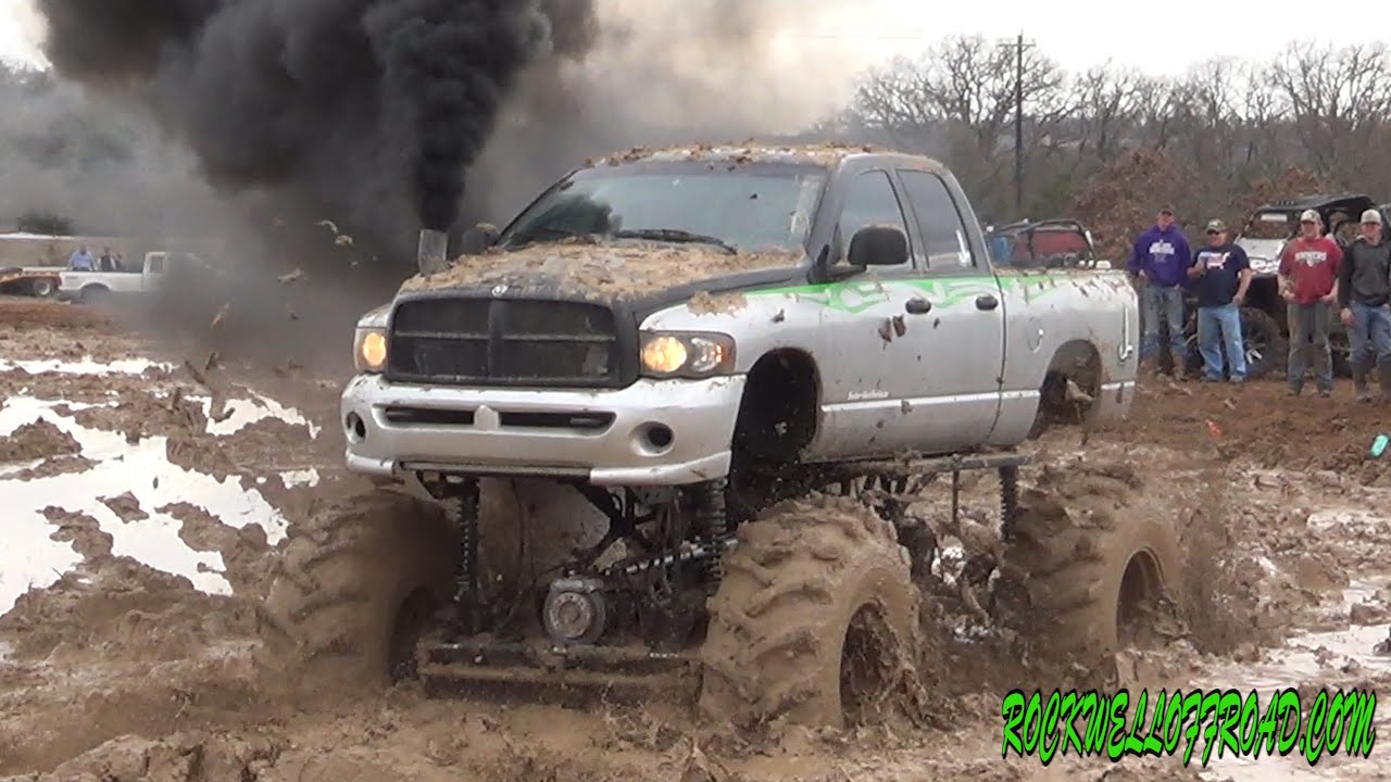 BIG MUD TRUCKS BATTLE!!  DODGE VS CHEVY!!!