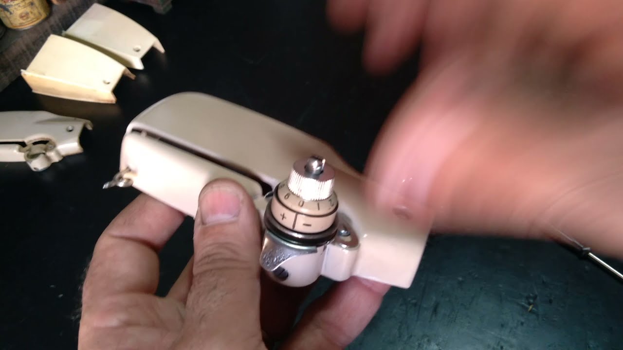 Como montar o tensor da máquina de costura Singer 660 666 e 667 e Ponto de Ouro