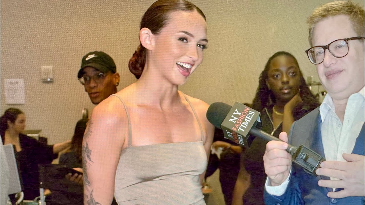 Model Claudia May backstage at Fashion Week