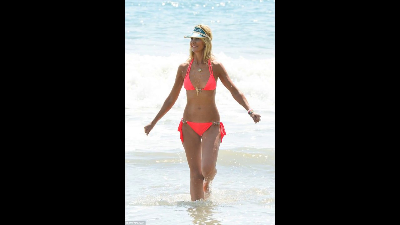 Lady Victoria Hervey 40 flaunts her abs in a tiny coral bikini at Malibu beach