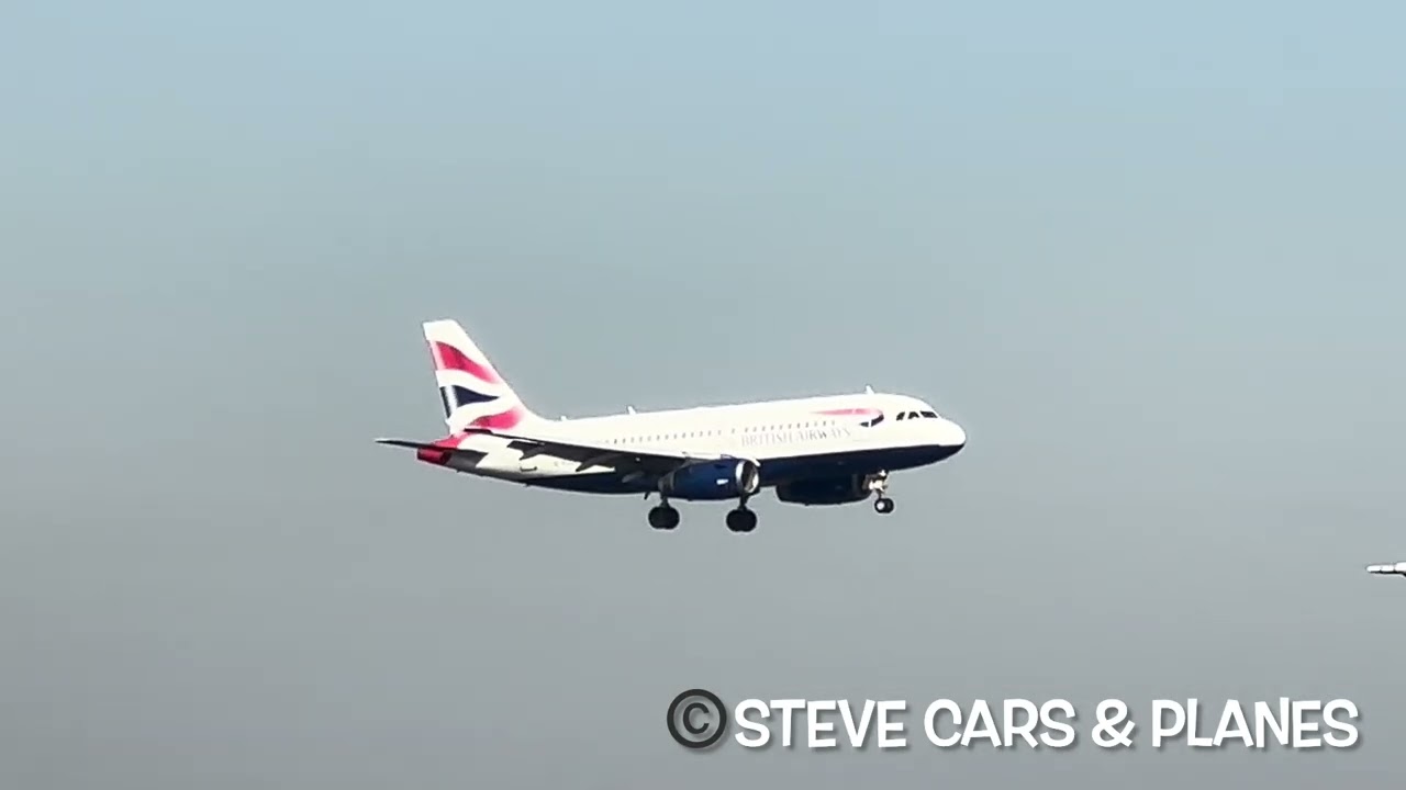British Airways Airbus A319 G-EUOE landing at London Heathrow from Zurich 