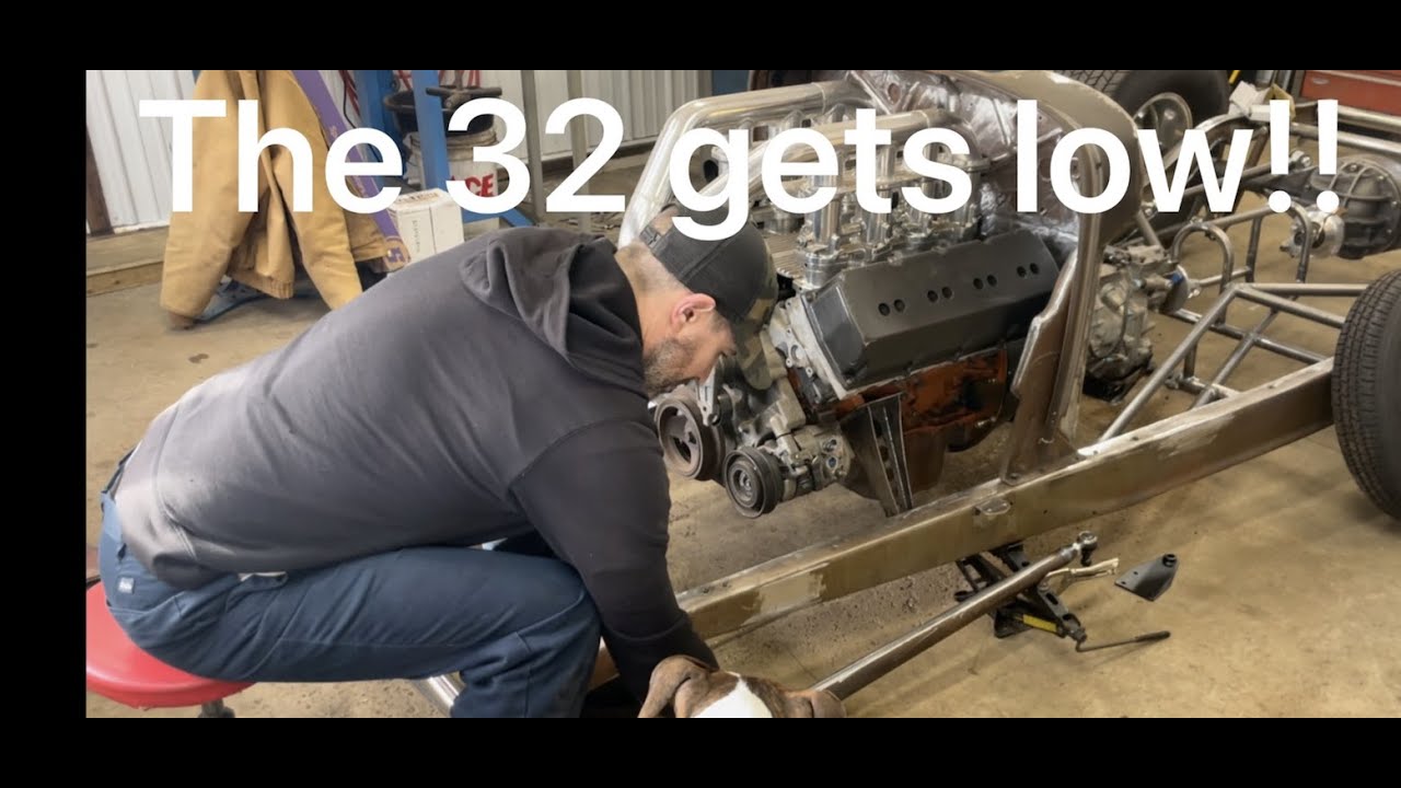 Leaf spring de-arch and wishbone mounting