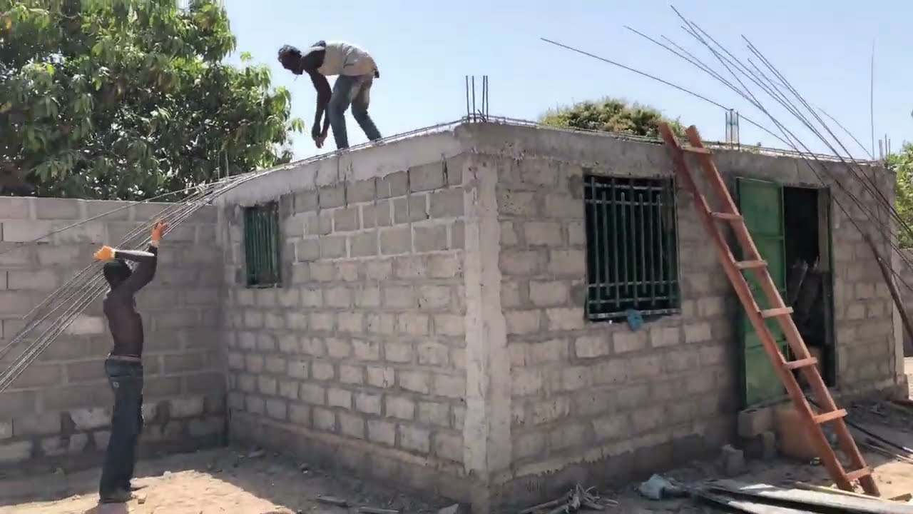The Arrival preparing to pour roof slab in The Gambia