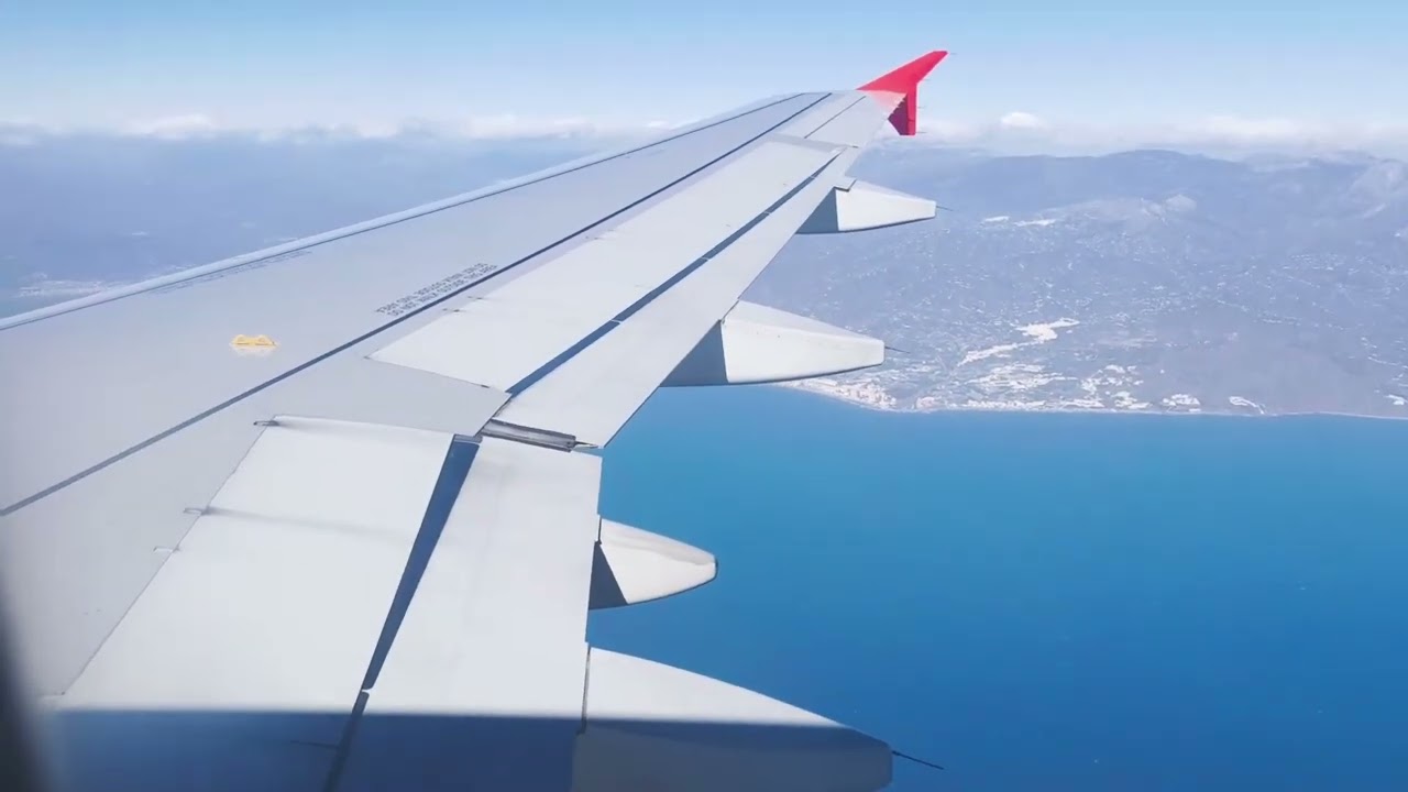 Landing at Málaga–Costa del Sol Airport (AGP) — filmed from the passenger window seat.20260123 1246