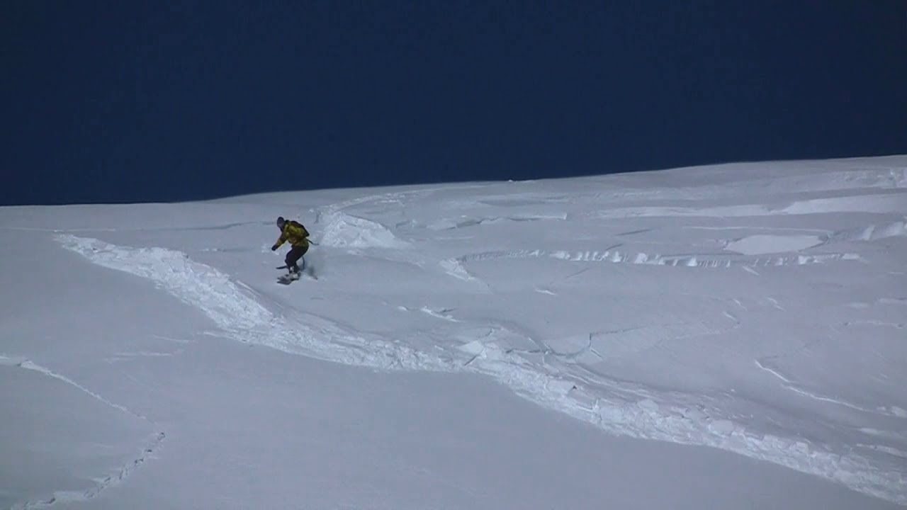 Snowboarding and skiing Freeride  Caught in an avalanche