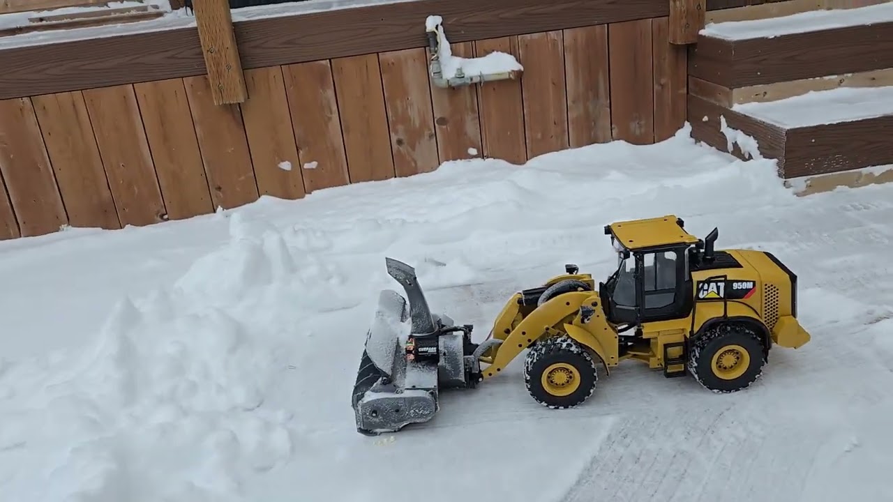 Testing my Cat 950 and snowblower attachment