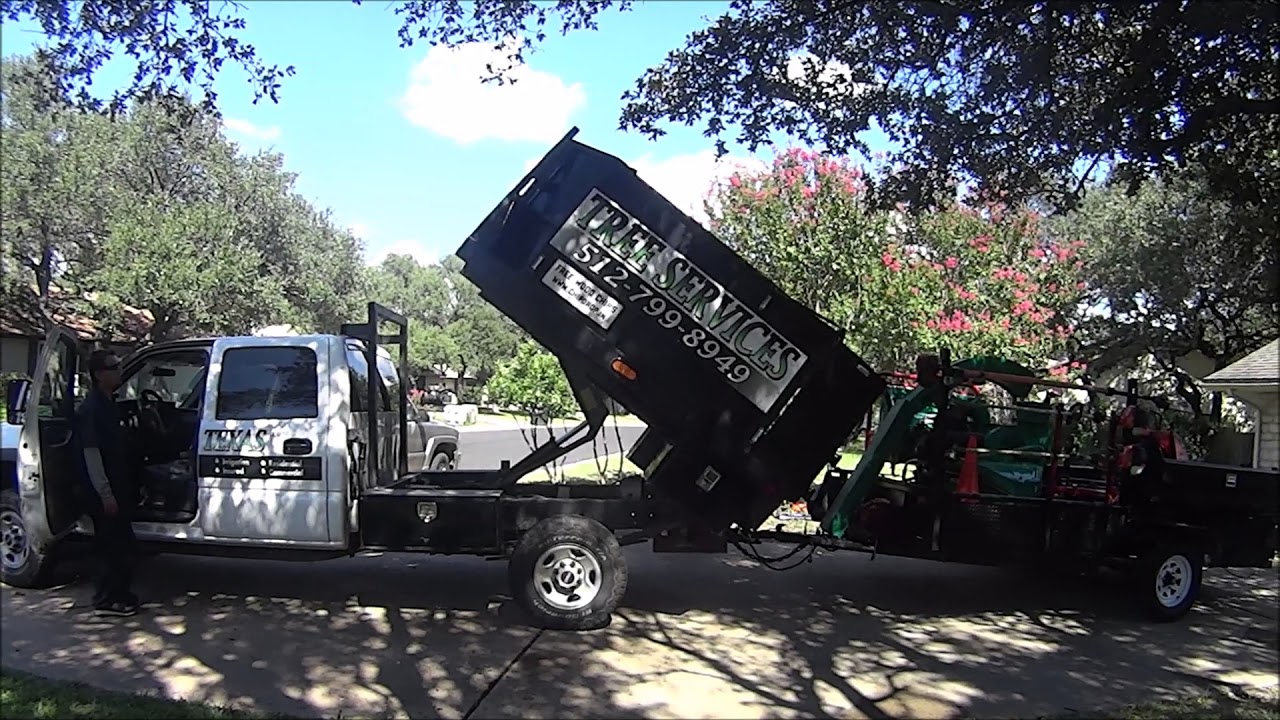Tree service rig for sale! Vermeer chipper, light duty dump truck, equipment trailer.