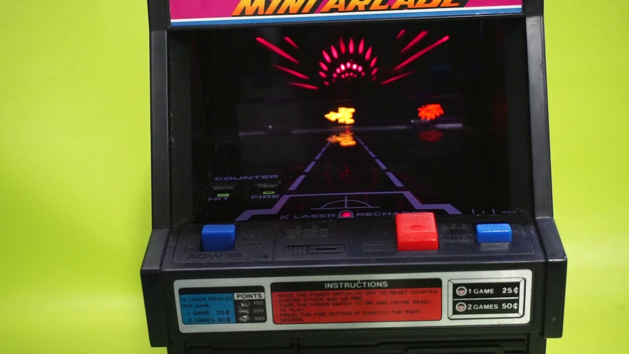 COSMIC CLASH MINI ARCADE GAME TOMY 1980S
