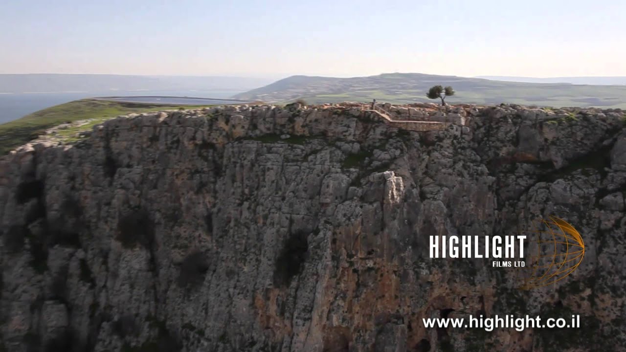 AN 003E Israel aerial footage: low lat aerial video of Arbel Cliff, with Sea of Galilee