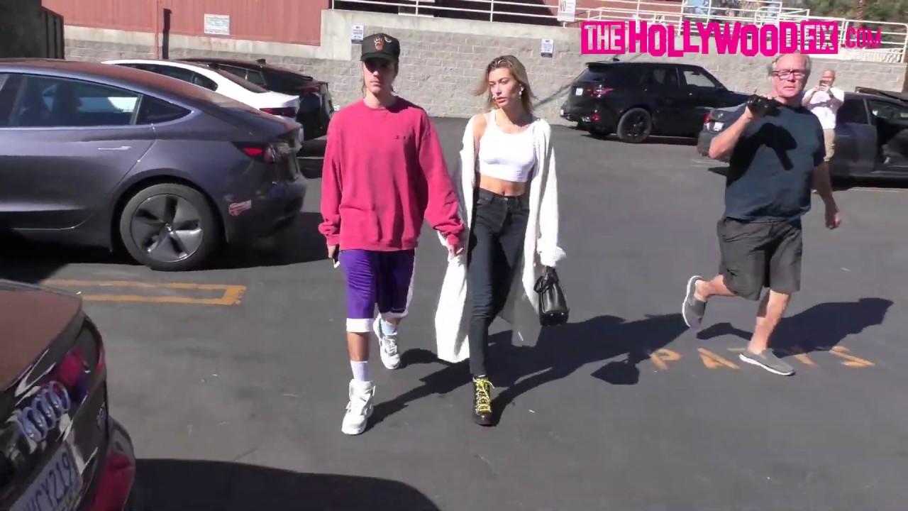 justin bieber and hailey baldwin hold hands in the street