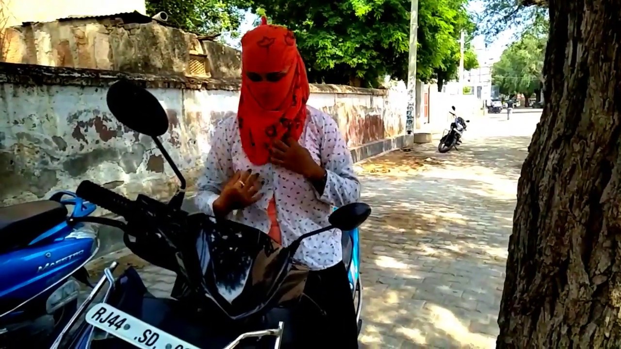 Face covered on scooter