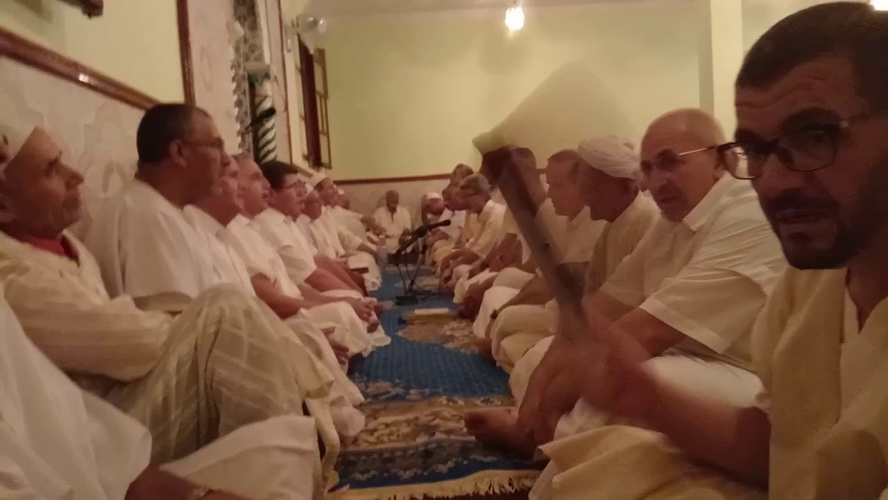 إفتتاح الجمع في ذكرى إنتقال الأستاذ الشيخ أحمد العلاوي رضي الله عنه في قرية أمزوڨ بني محلي الجزائر