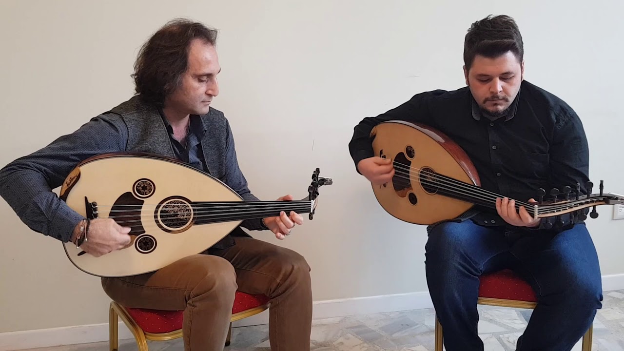 YURDAL TOKCAN VE TOLGA KARASLAN 