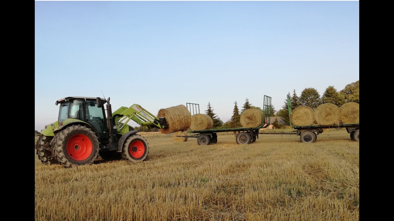 Zwożenie słomy Claas Arion 430