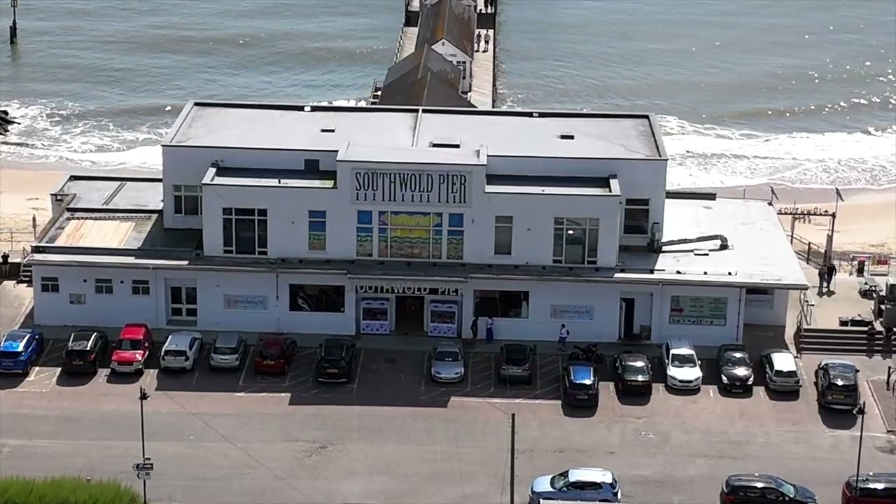 Southwold's Coastal Gems   A Drone's Eye View of Pier & Lighthouse