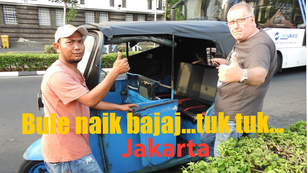 The hectic of Jakarta traffic,  Tuk Tuk drive, Indonesia.