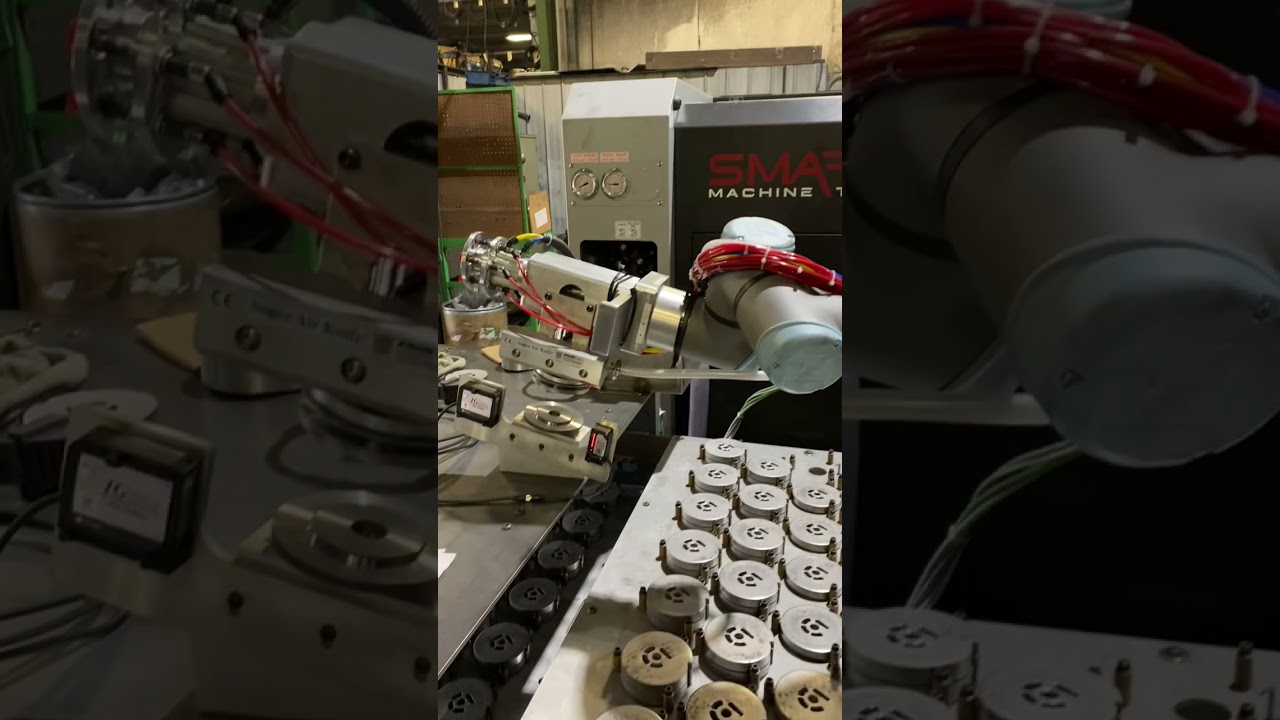 Metal Kraft Industries, Inc. Robotic Automation for Powder Metal Part Handling.