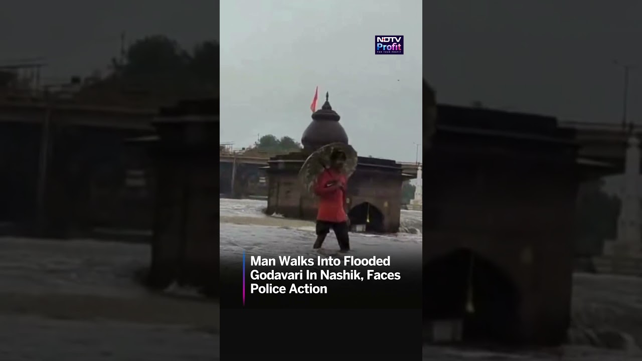 Watch: Man Risks Life In Flooded Godavari, Faces Police Action | #shorts