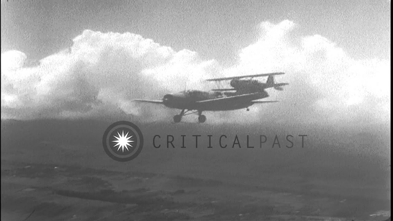 US Navy Grumman J2F and Vought OS2U land plane in flight during World War II HD Stock Footage