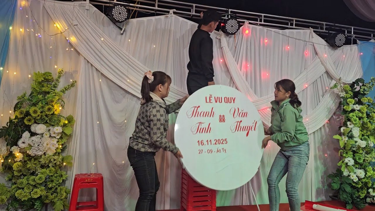 Rural girl prepares the theater and stage for the wedding party.