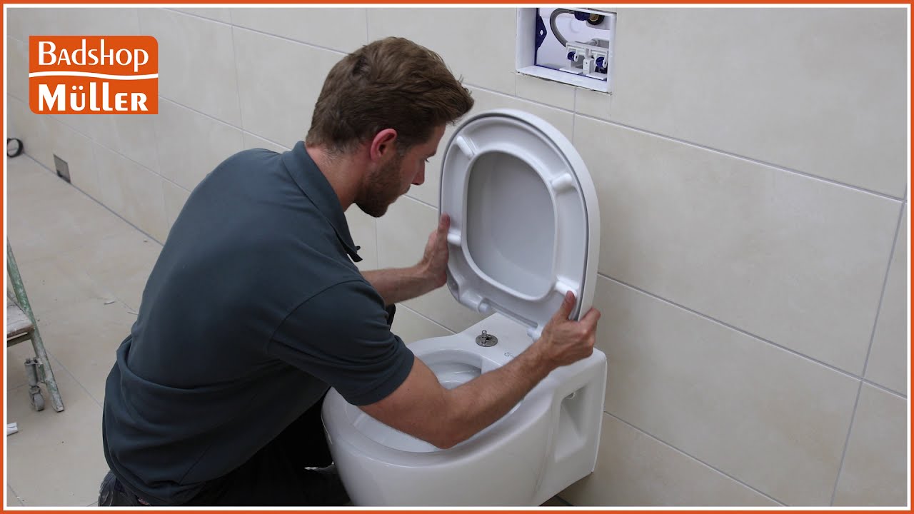 Wie montiere ich einen WC-Deckel/WC-Sitz?