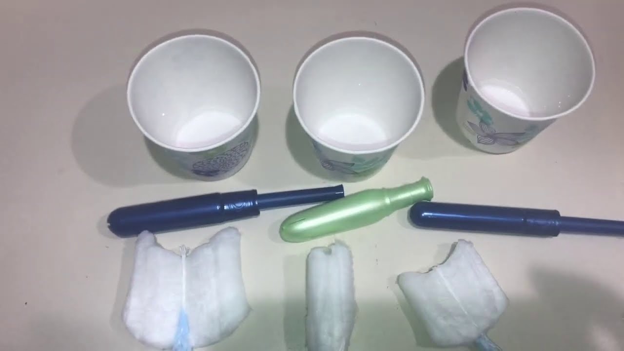 Tampon Absorbency Test!! (Tampax Pearl Reg VS Playtex Sport Reg)