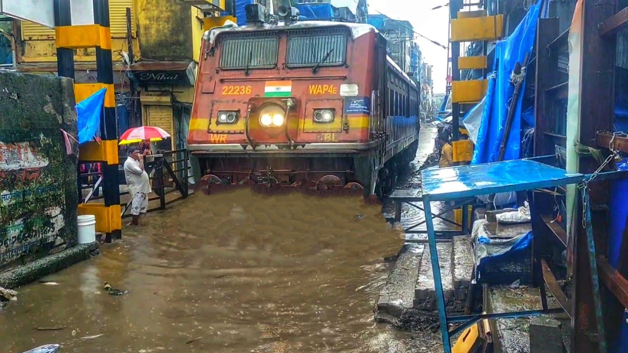 Indian Train Locomotive swim On Water due to heavy rain in Mumbai slum | Indian Railways.