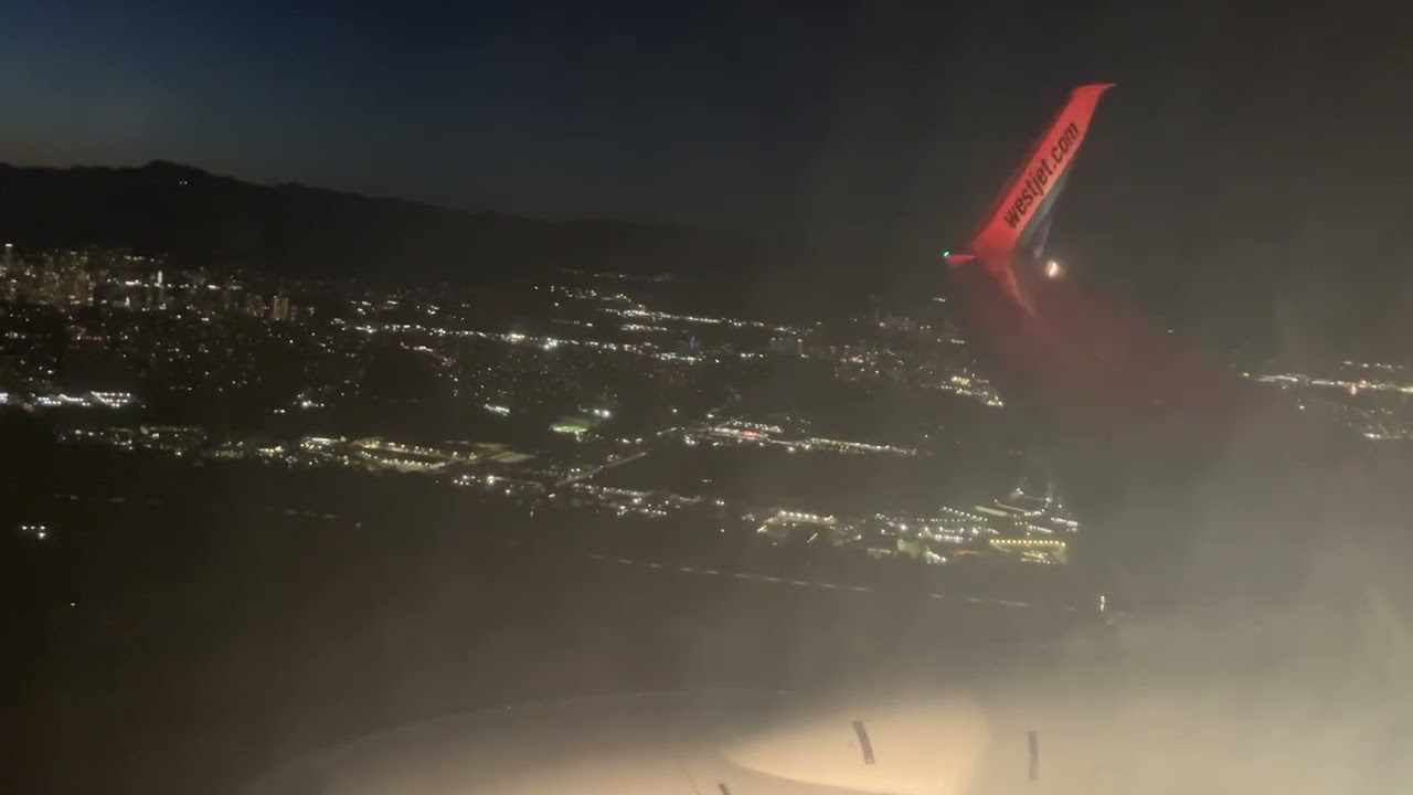 WestJet 737-800 summer night landing in Vancouver