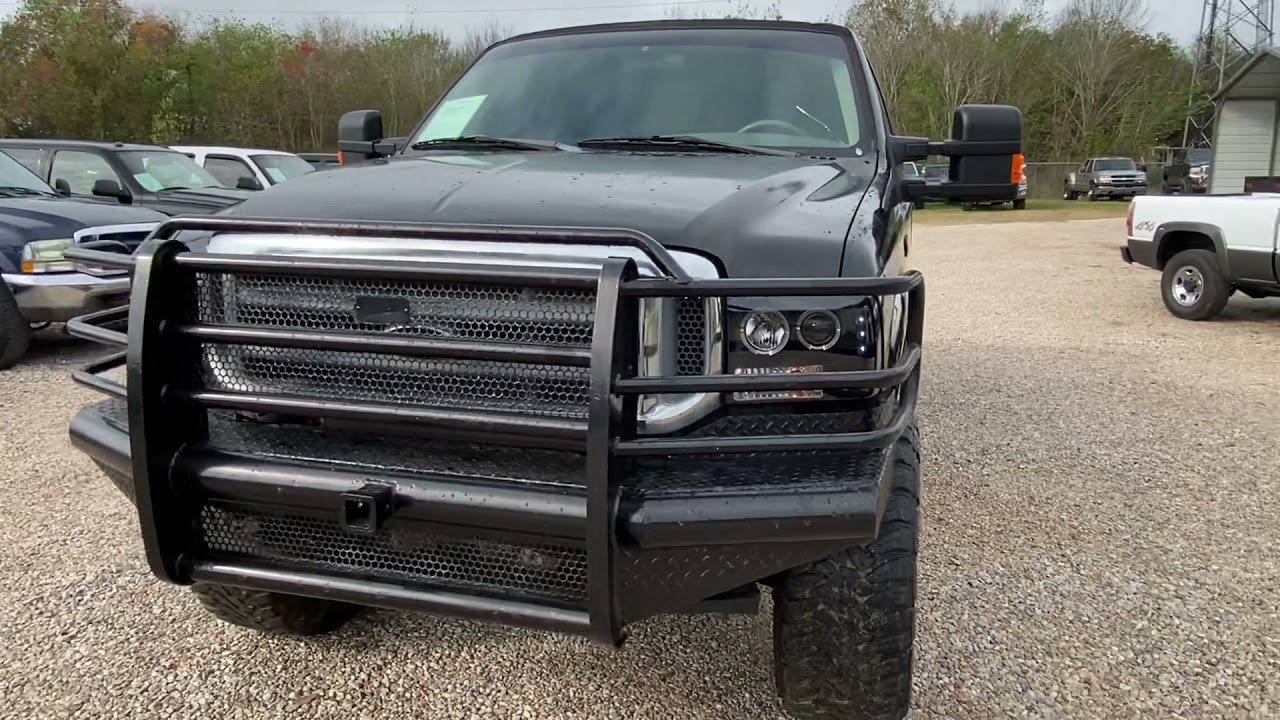 2001 Ford F250 4x4 7.3L (black) - AngletonTrucks.com
