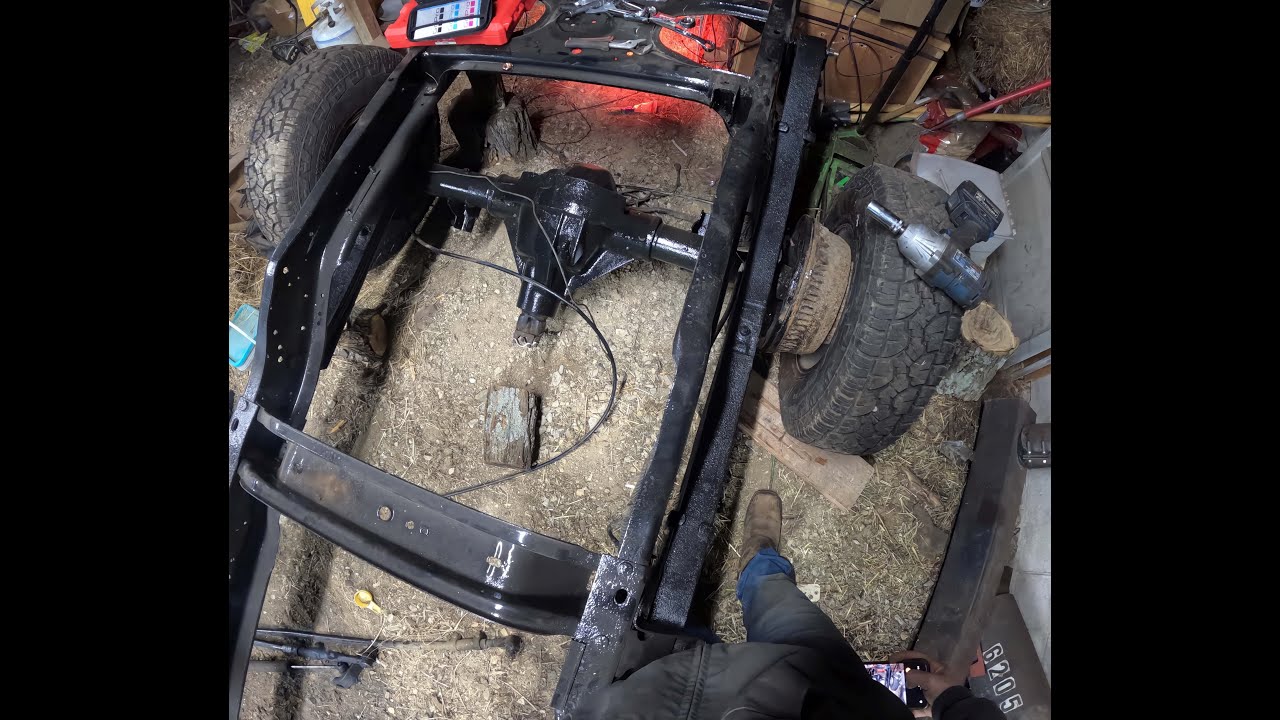 how to put the rear axle on a 1997 dodge 3500 frame