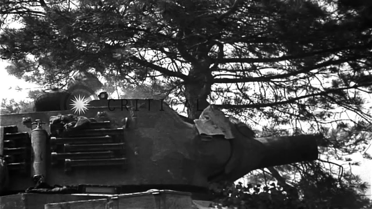 United States M4 medium tank and M8 HMC are fired by US Troops in France. HD Stock Footage