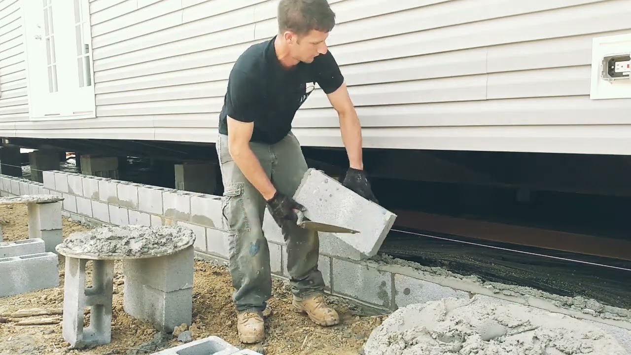 Laying Block Foundation/Side Skirting on Mobile Home.