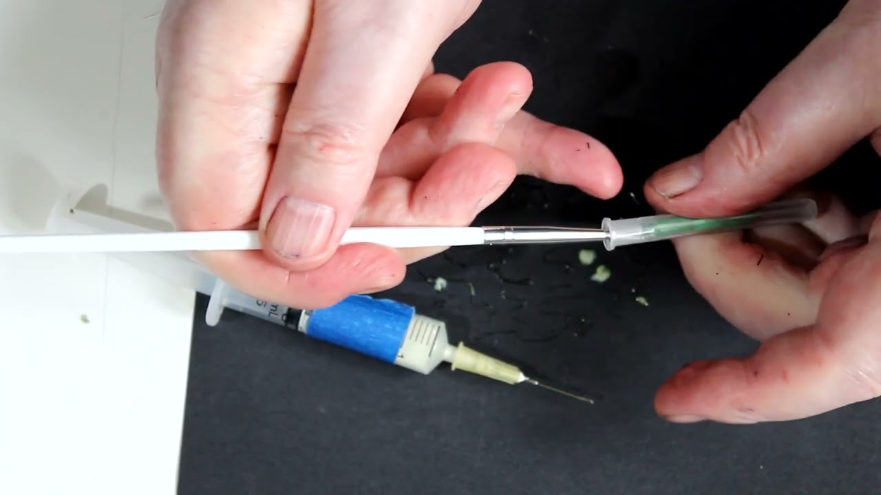 Making a masking fluid pen for fine lines in a water colour painting