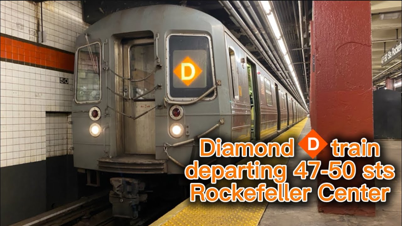 R68 Diamond D train departing 47-50 sts-Rockefeller Center