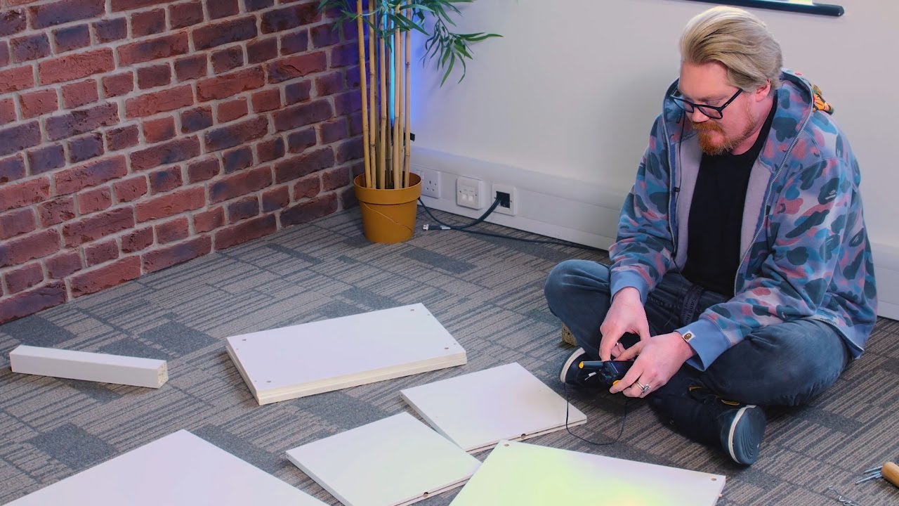 Duncan and Osie attempt to build IKEA furniture with Walkie Talkies