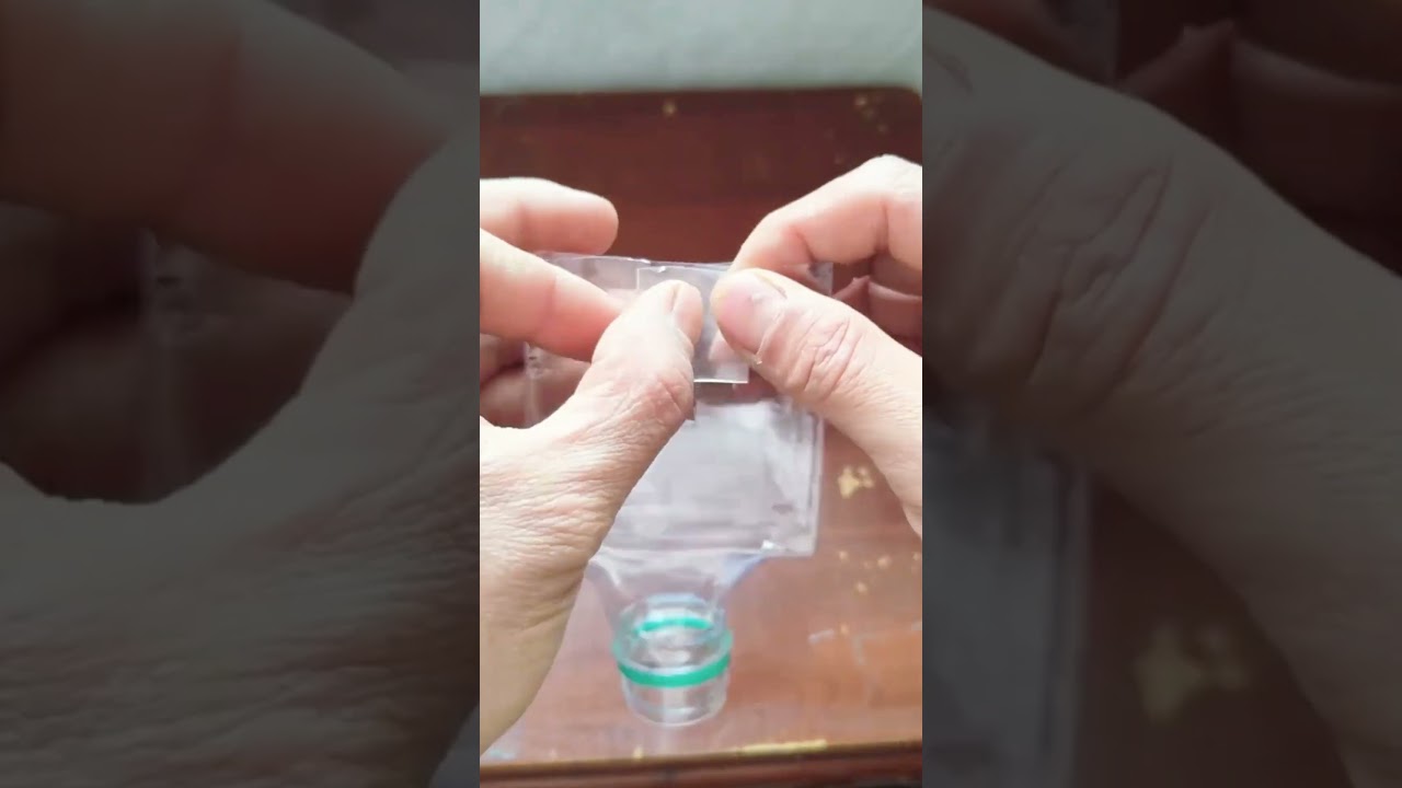 Creativity in making remote storage using plastic bottles #remote #storage #plasticbottle #shorts