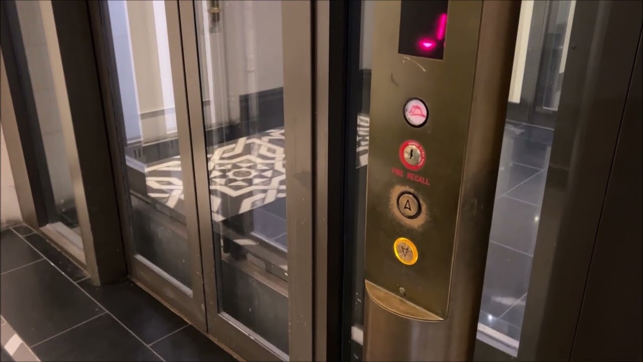 Generic Glass Hydraulic Lobby Elevator at Stewart Hotel, New York City NY