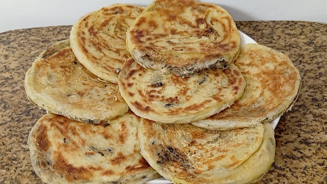 أسرار الملوي مخمار بحشوة الزيتون والفرماج: خفة القطن ومذاق لا يقاوم!