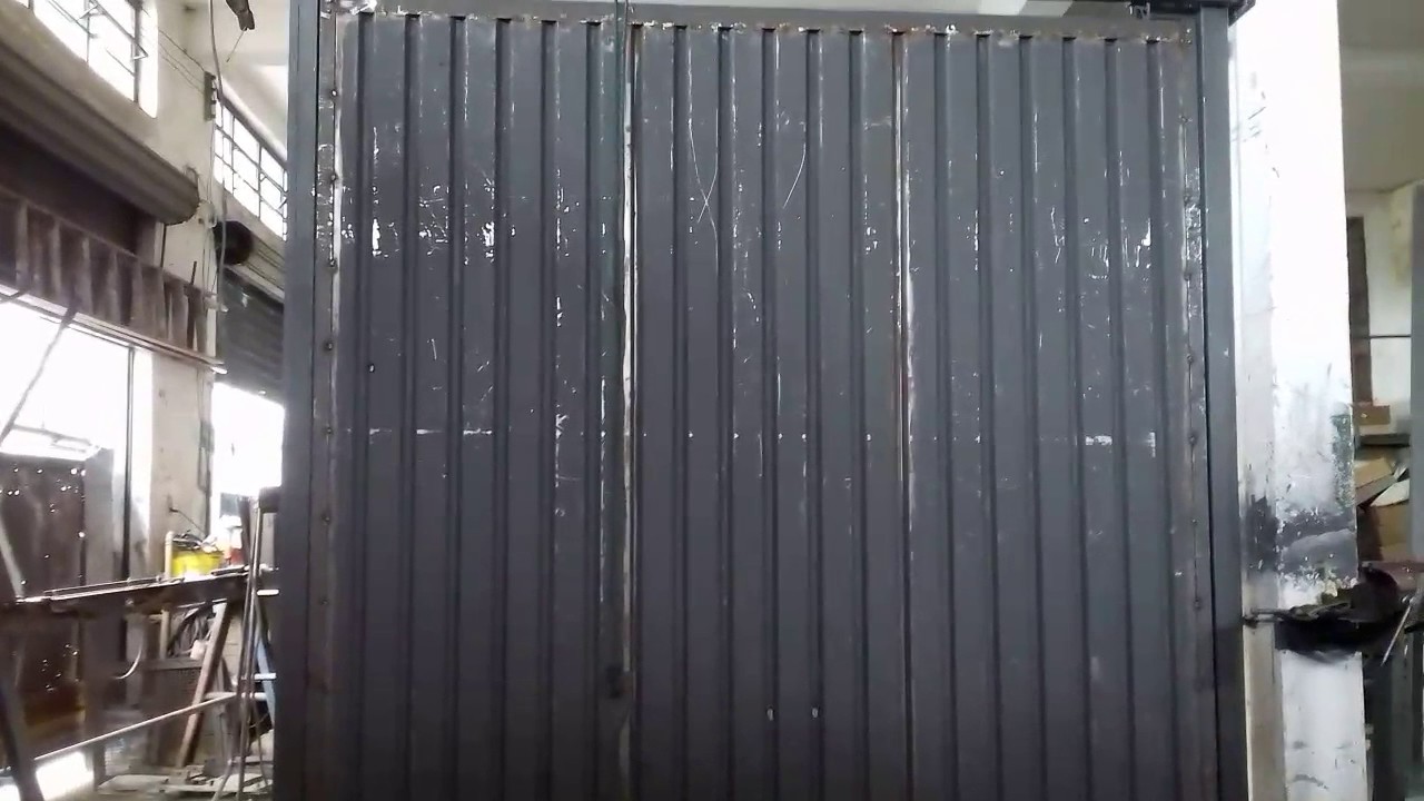 Portão basculante com contrapeso de bobinas de molas de aço