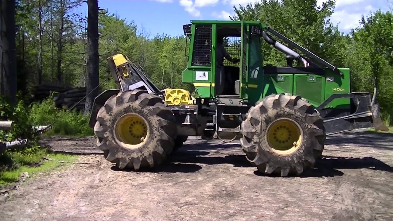 John Deere 540GIII Skidder Unloading & 1st Look