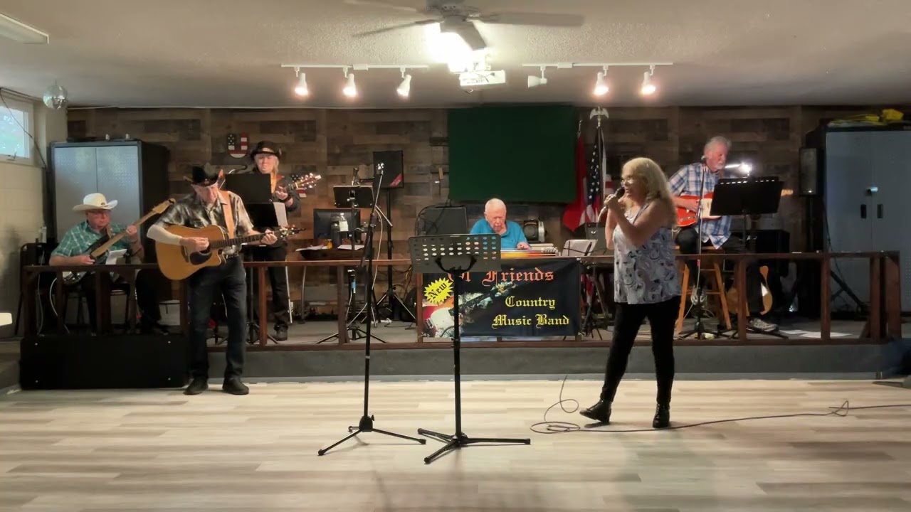 Sandy singing at New Ol Friends,  Harper Valley PTA