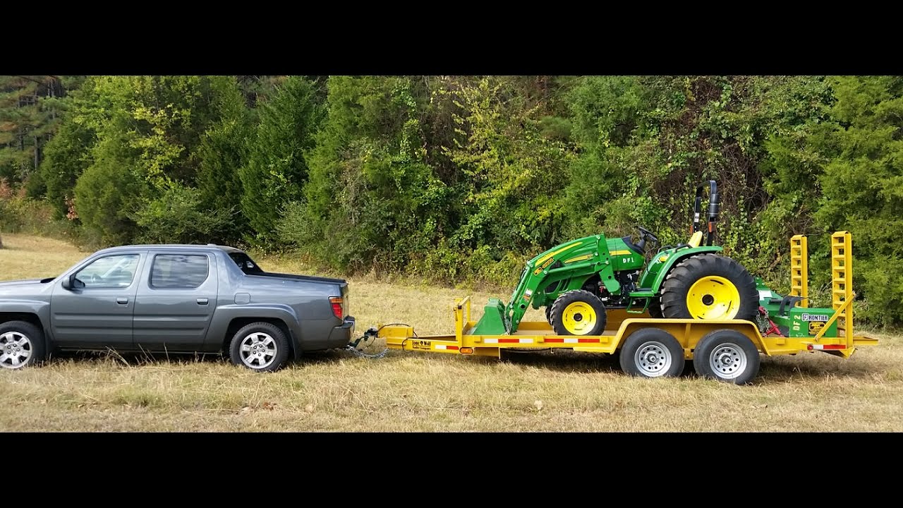 Honda Ridegeline Towing heavy tractor (~7,000lbs!)