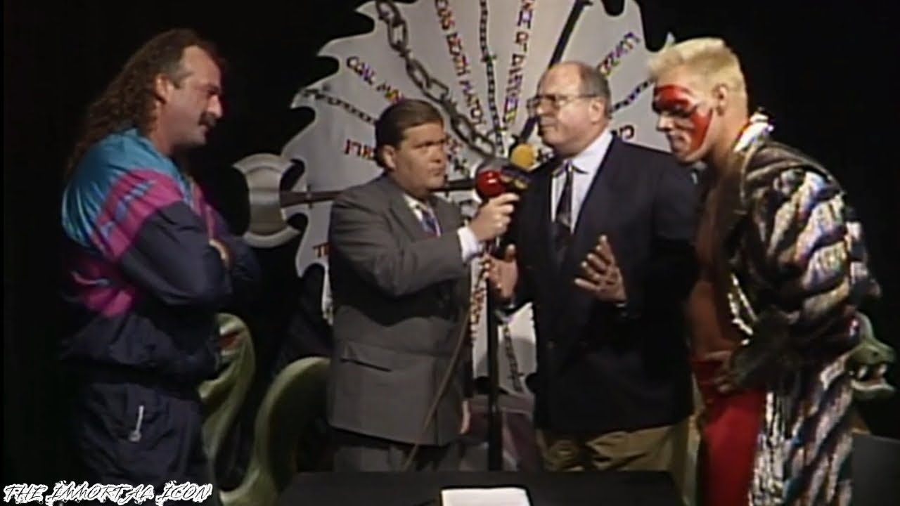 Sting and Jake The Snake Roberts contract signing for Halloween Havoc 1992