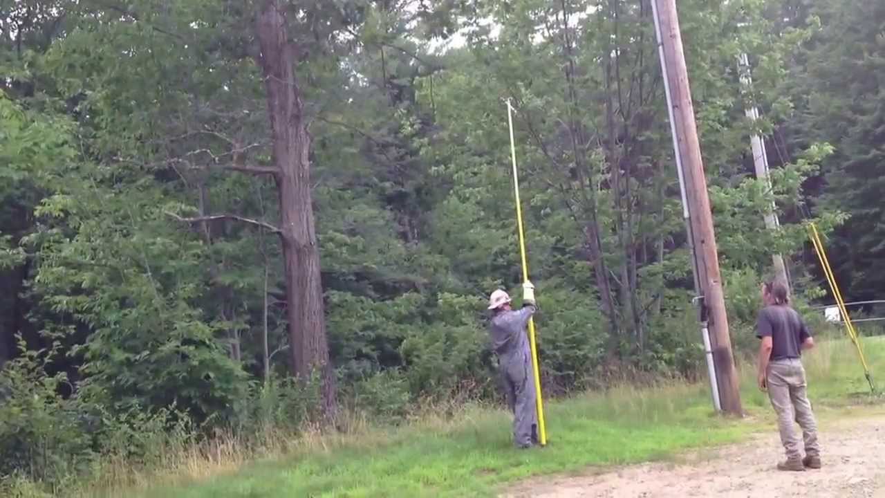Pulling down a cutout with a hot stick