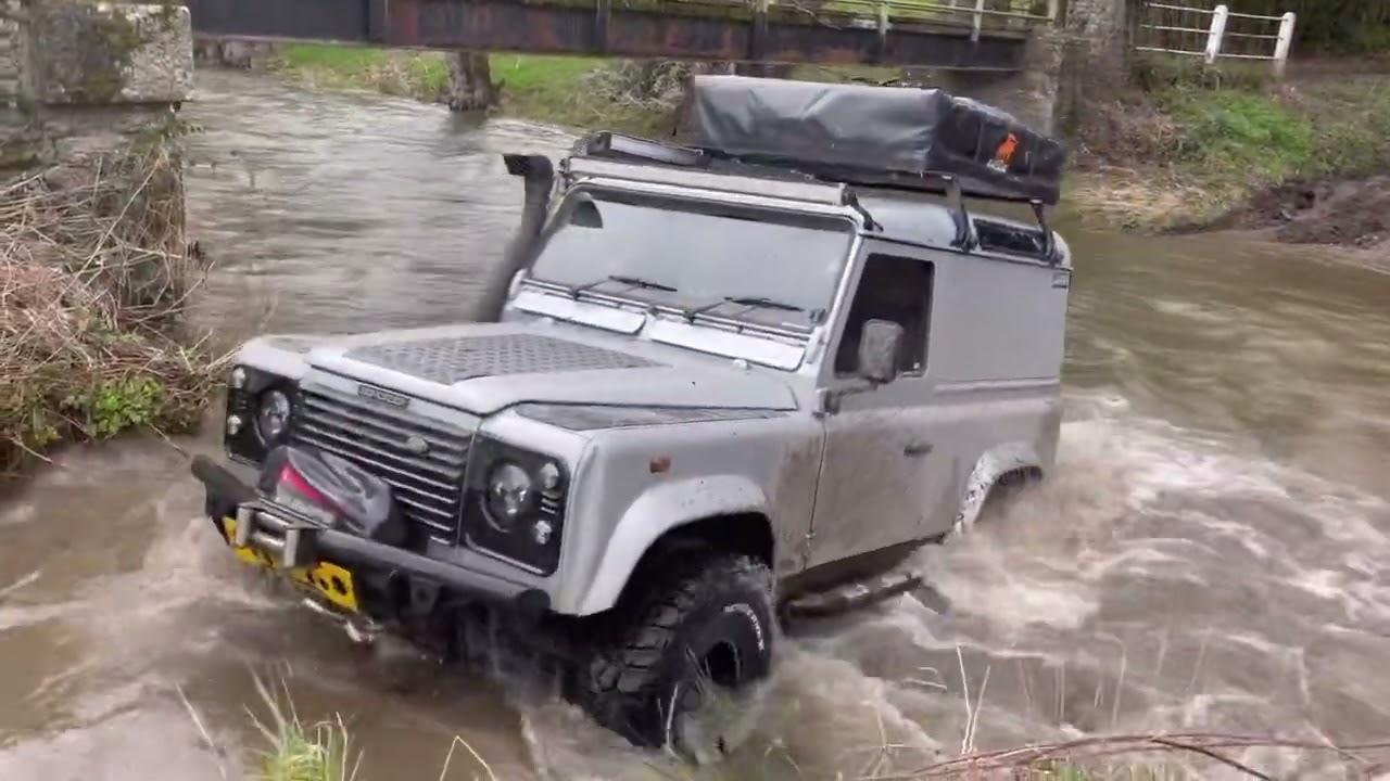 Green laning in mid Wales  with Timeless overland tours. Defender Discovery Surf