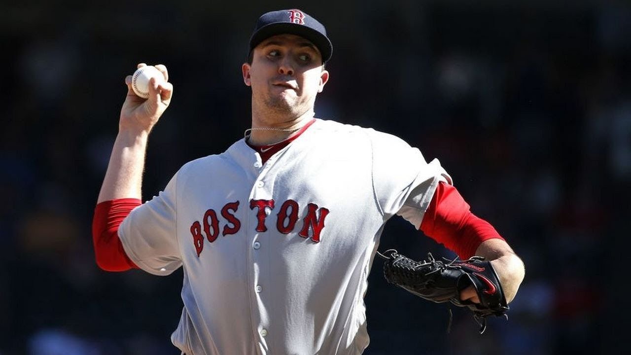 Reliever Carson Smith of the Boston Red Sox suffers potential shoulder damage by throwing a glove.