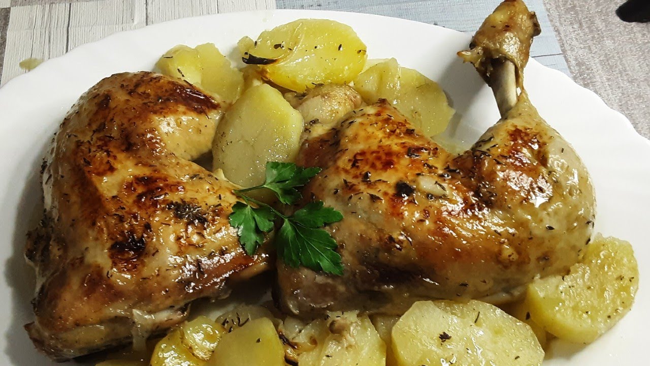 Pollo asado al horno con papas y cebolla