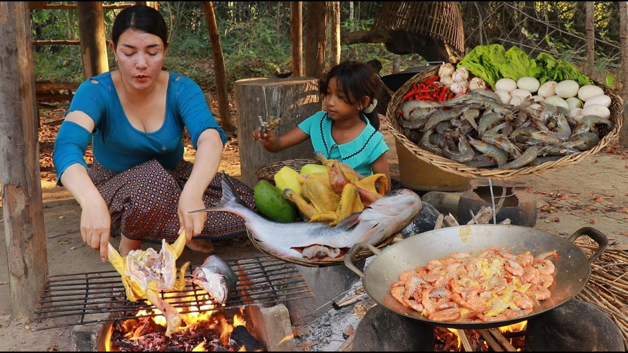 Cooking shrimp with egg for special recipe/ Grilled chicken and fish for lunch
